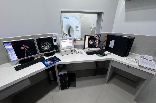 CT Scan Control Room — Multi-Screen Workstation